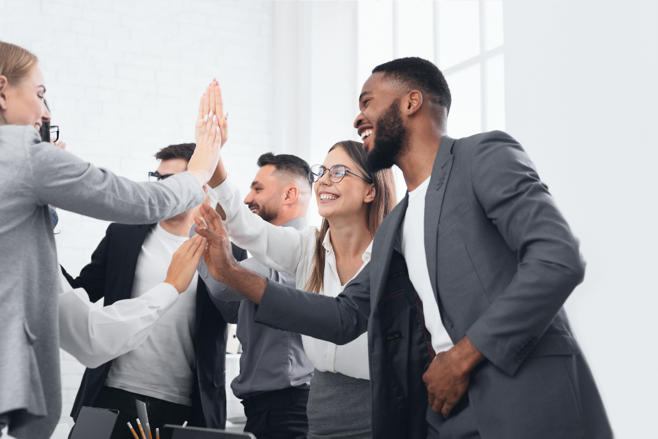 Image showing businesspeople high fiving